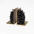 Pinecone Cast Iron Bookends on a white background at Addison West