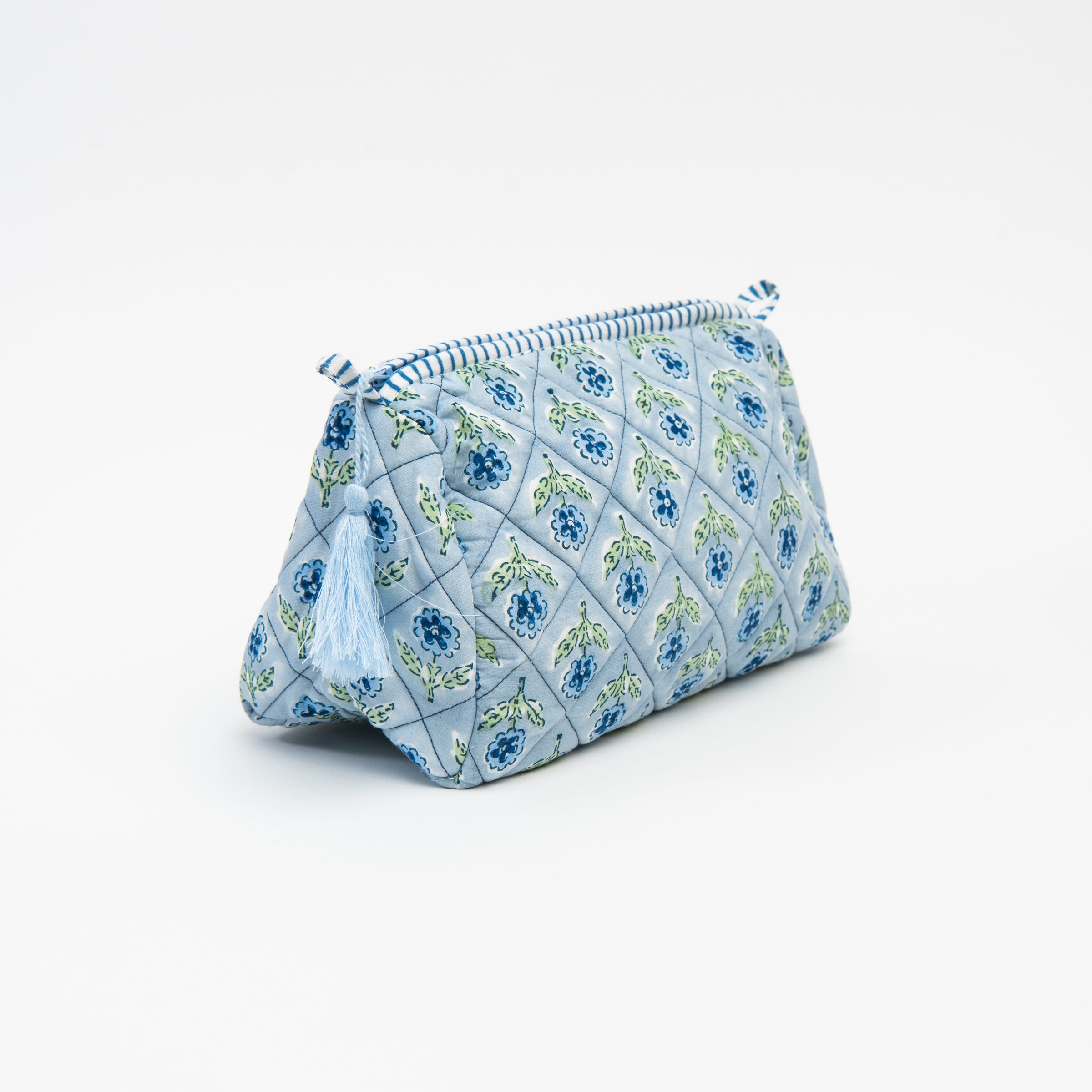 Side of Mona Print Toiletry Bag in Blue on a white background at Addison West