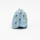 Side of Mona Print Toiletry Bag in Blue on a white background at Addison West