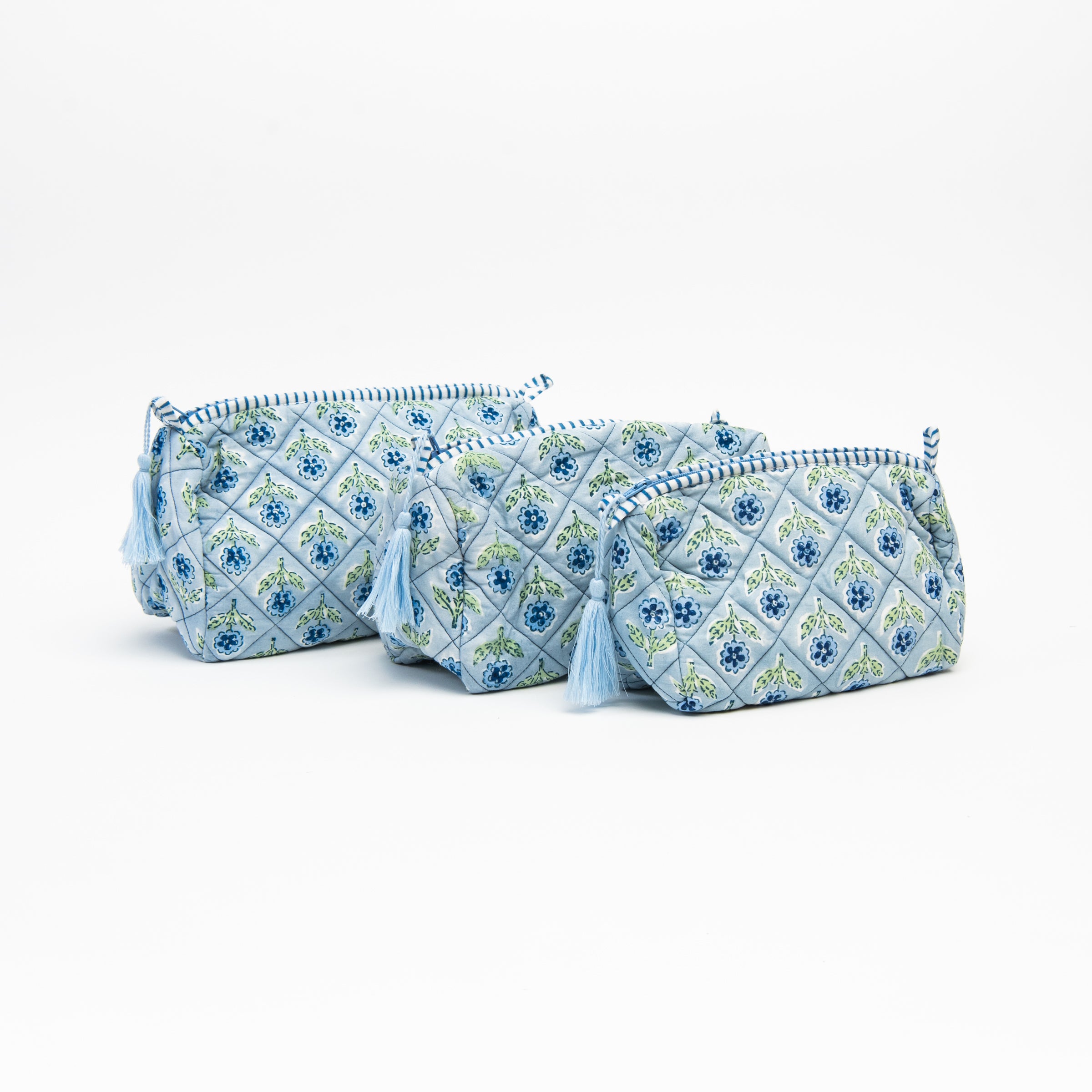 Mona Print Toiletry Bag in Blue on a white background at Addison West