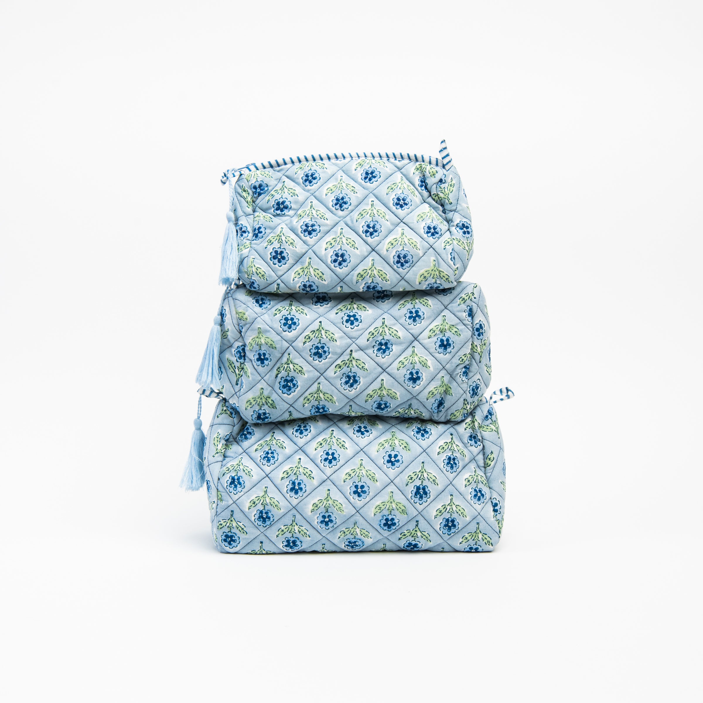 Mona Print Toiletry Bag in Blue on a white background at Addison West