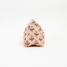 Side of Mona Print Toiletry Bag in Pink on a white background at Addison West