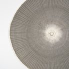 Close up of Willa Woven Placemat in Stone on a white background at Addison West