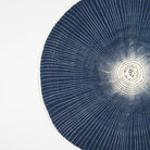 Close up of Willa Woven Placemat in Navy on a white background at Addison West