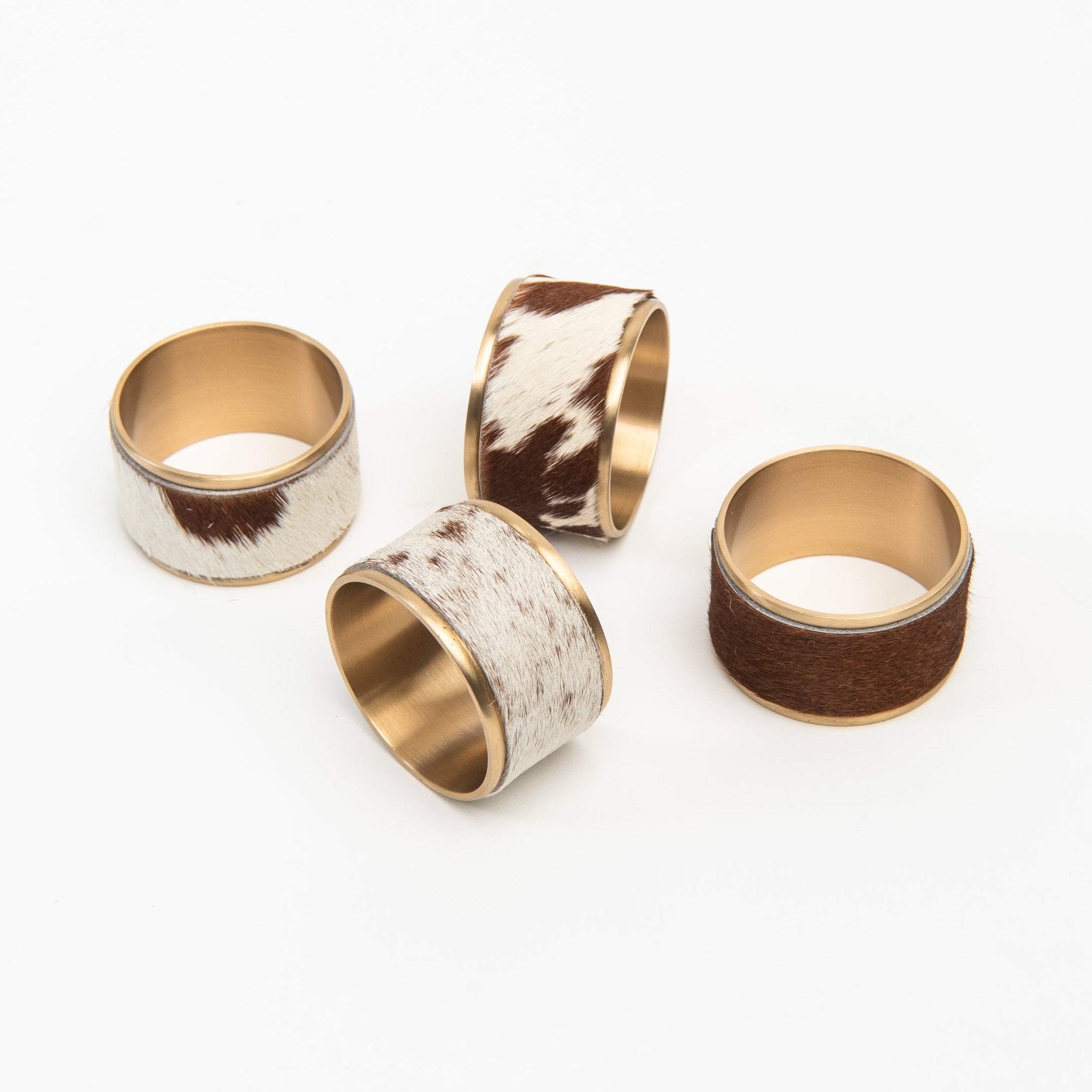 Cow Hide Napkin Rings, Set of 4 on a white background at Addison West