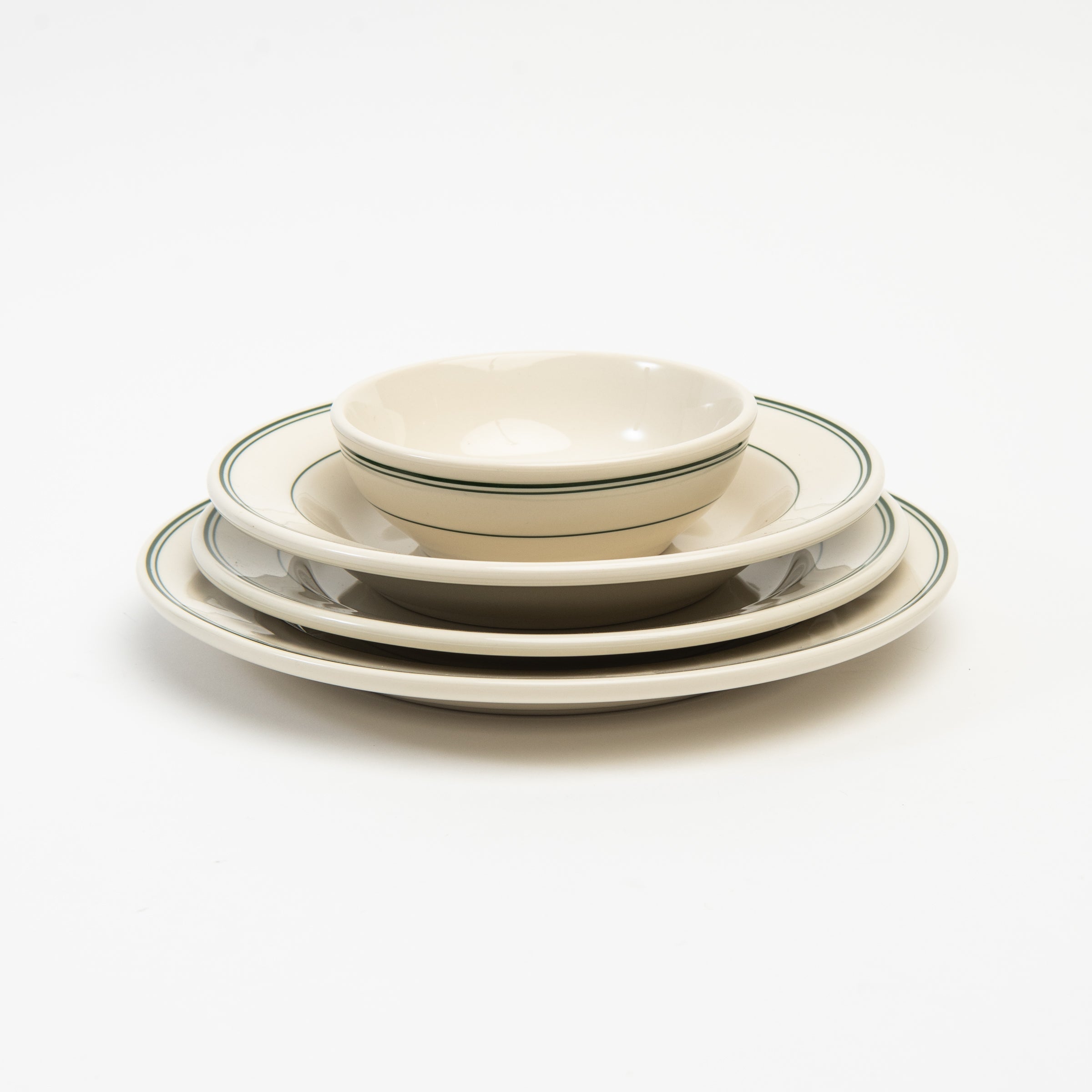 Fish's Eddy Greenband  Plate set on a white background at Addison West