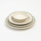 Fish's Eddy Greenband Plate set on a white background at Addison West