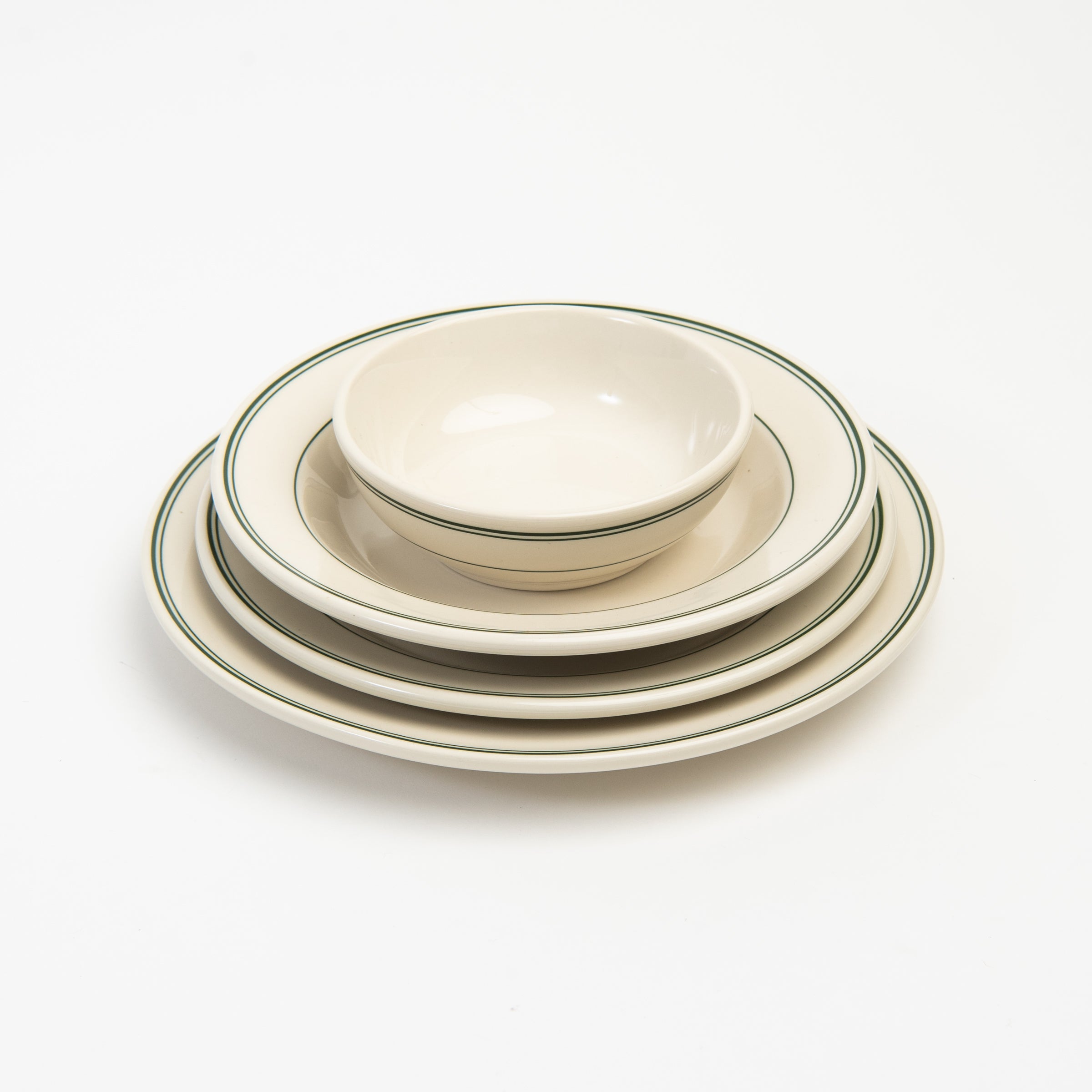 Fish's Eddy Greenband Plate set on a white background at Addison West