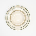 Fish's Eddy Greenband Plate set on a white background at Addison West