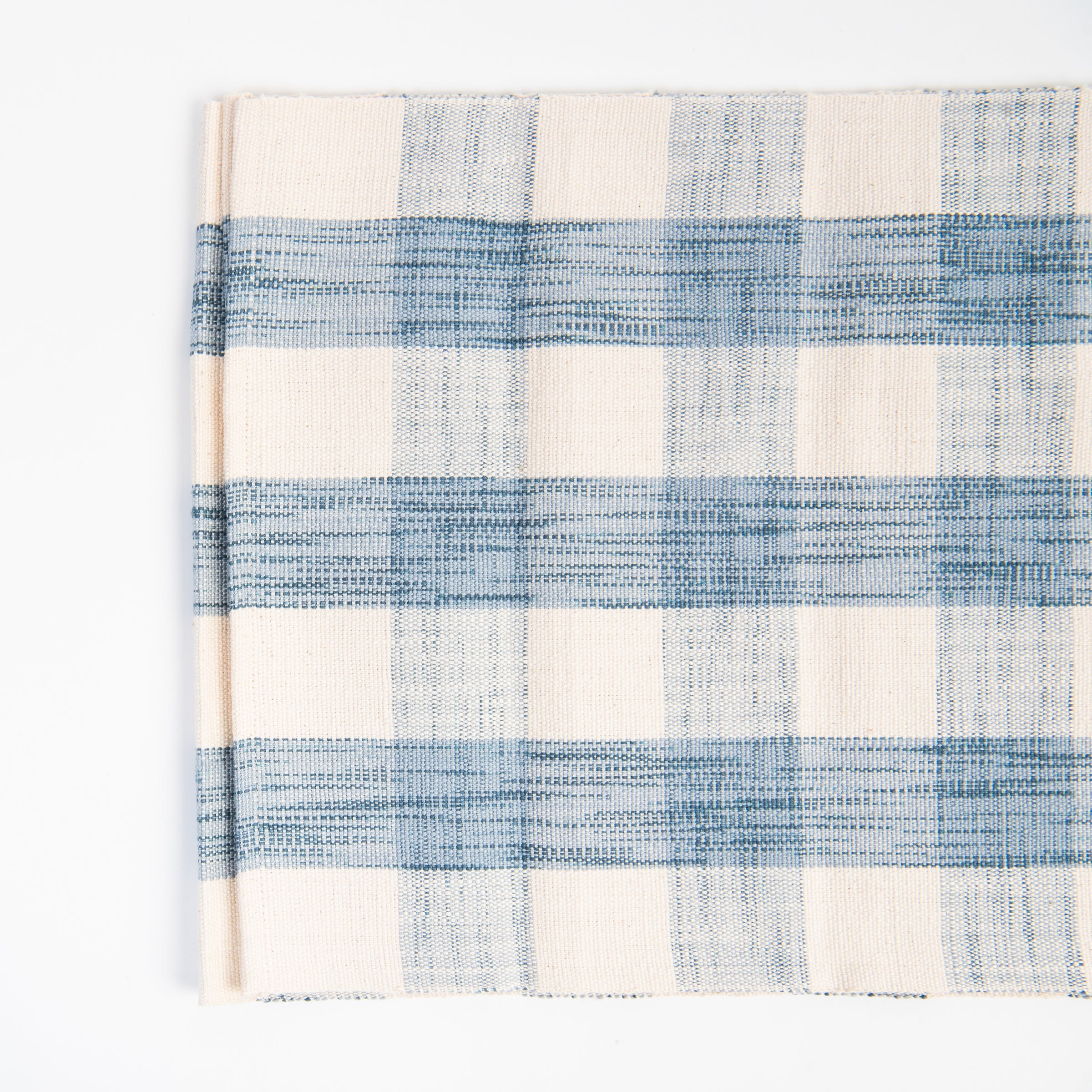 Grace Gingham Table Runner in Light Blue on a white background at Addison West