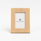 Caramelo Frame on a white background at Addison West
