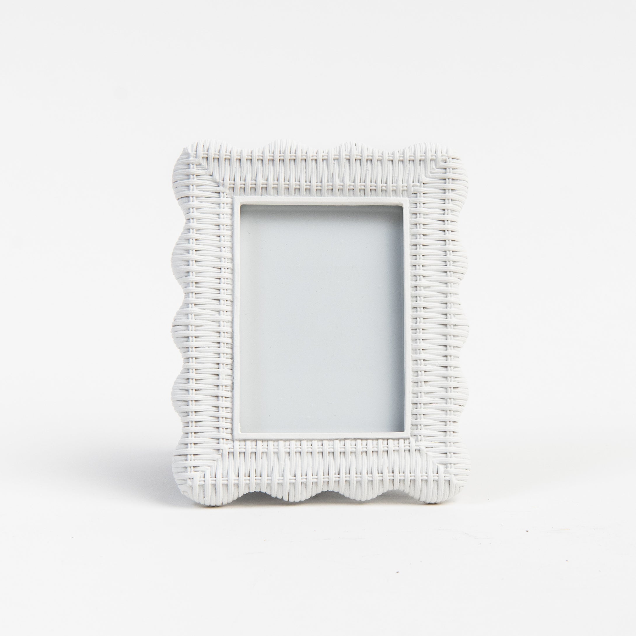 Scalloped Rattan Weave Picture Frame on a white background at Addison West