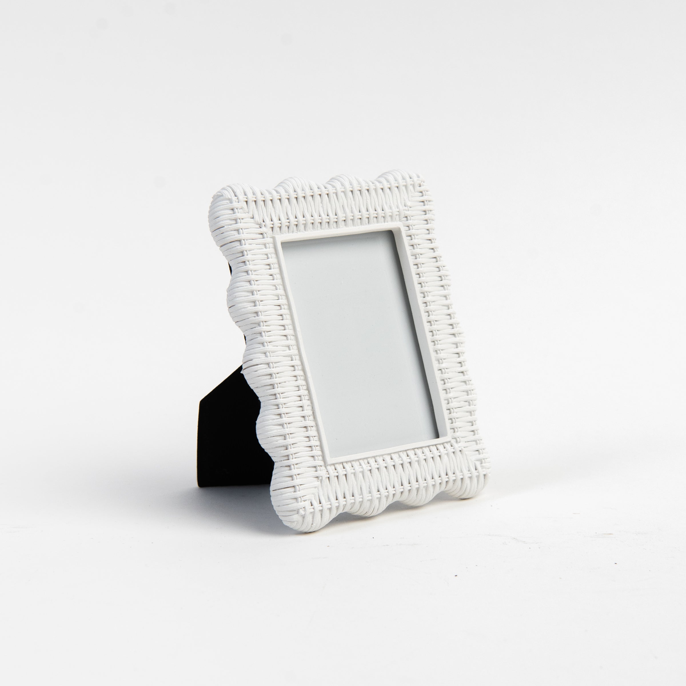 Scalloped Rattan Weave Picture Frame on a white background at Addison West