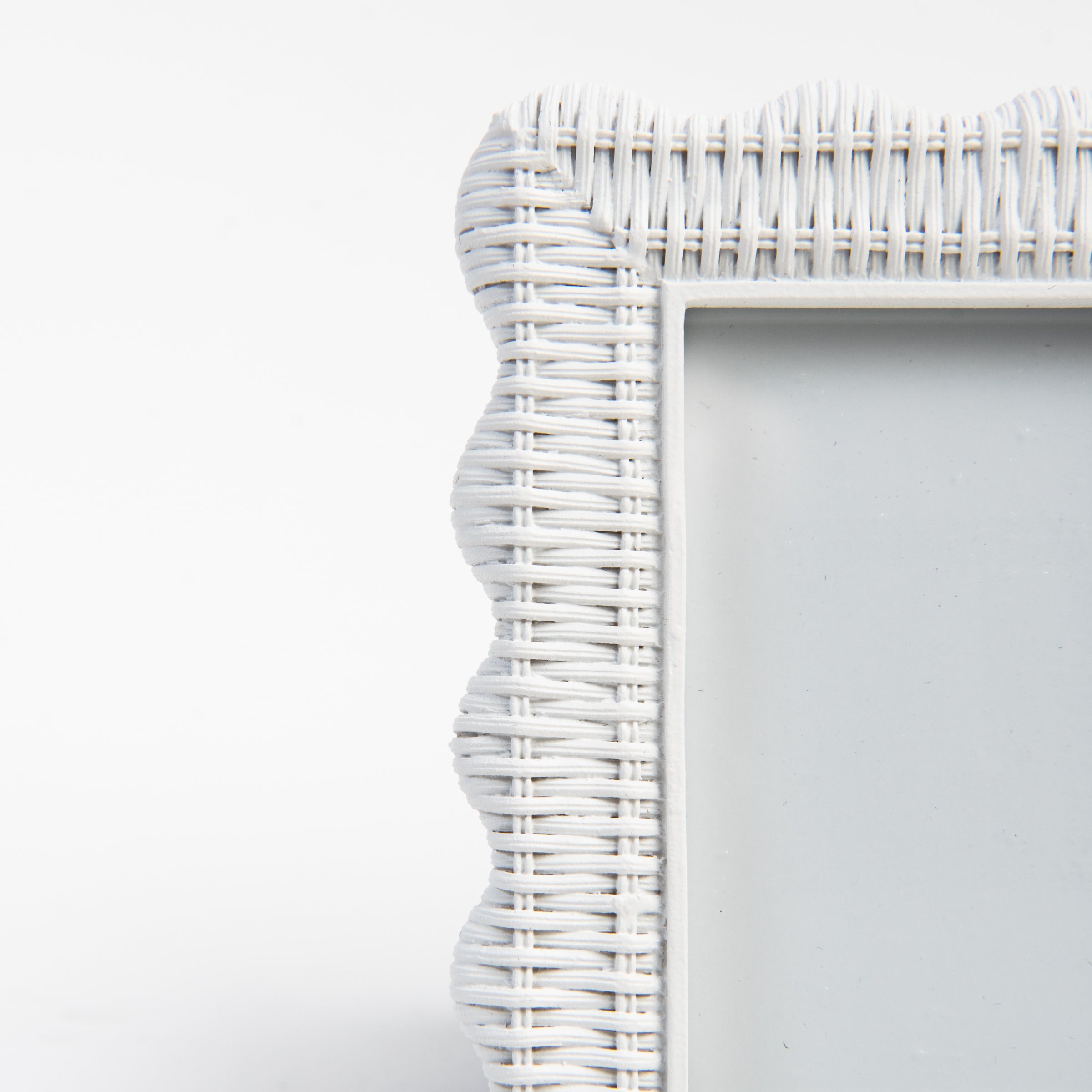 Scalloped Rattan Weave Picture Frame on a white background at Addison West