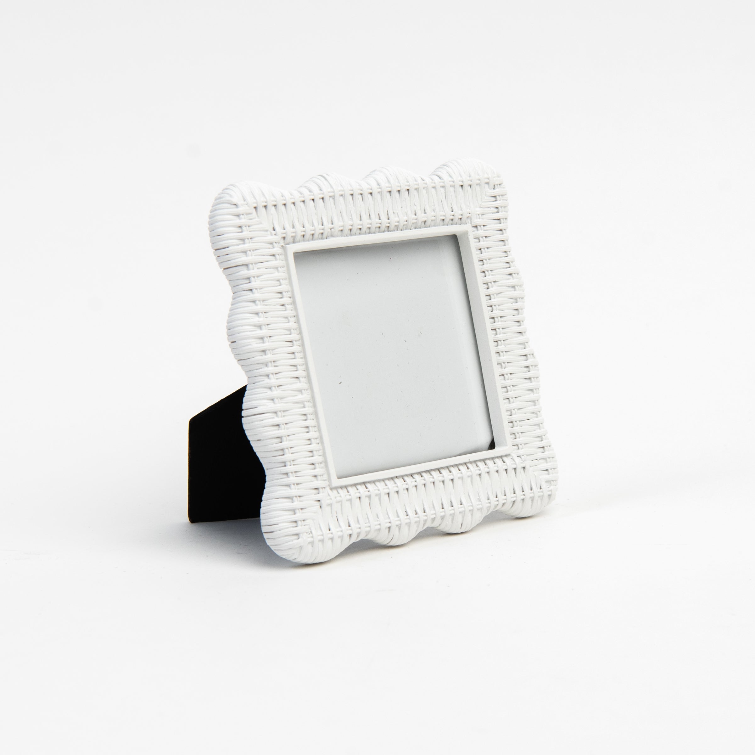 Scalloped Rattan Weave Picture Frame on a white background at Addison West