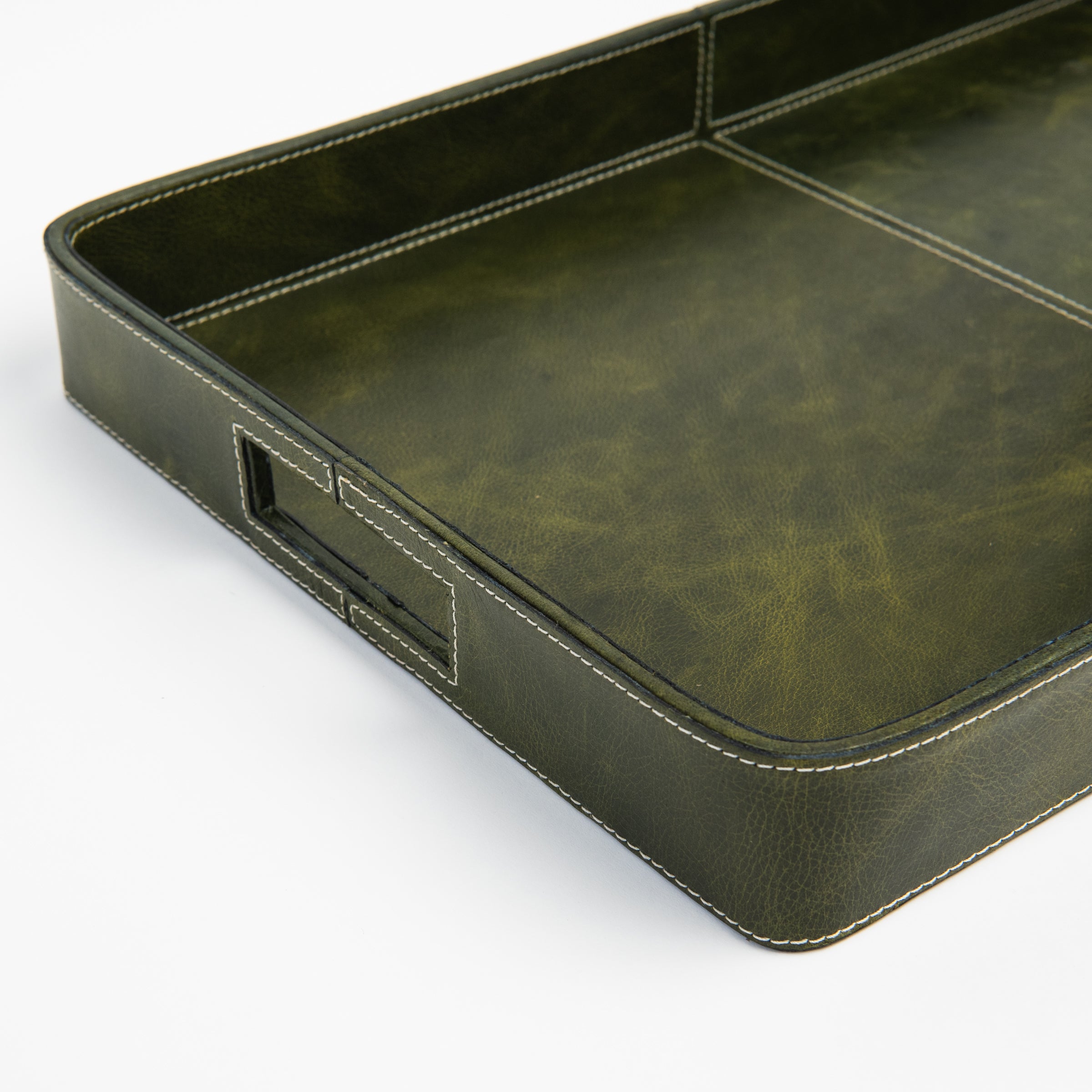 Close up of Olive Leather Tray on a white background at Addison West