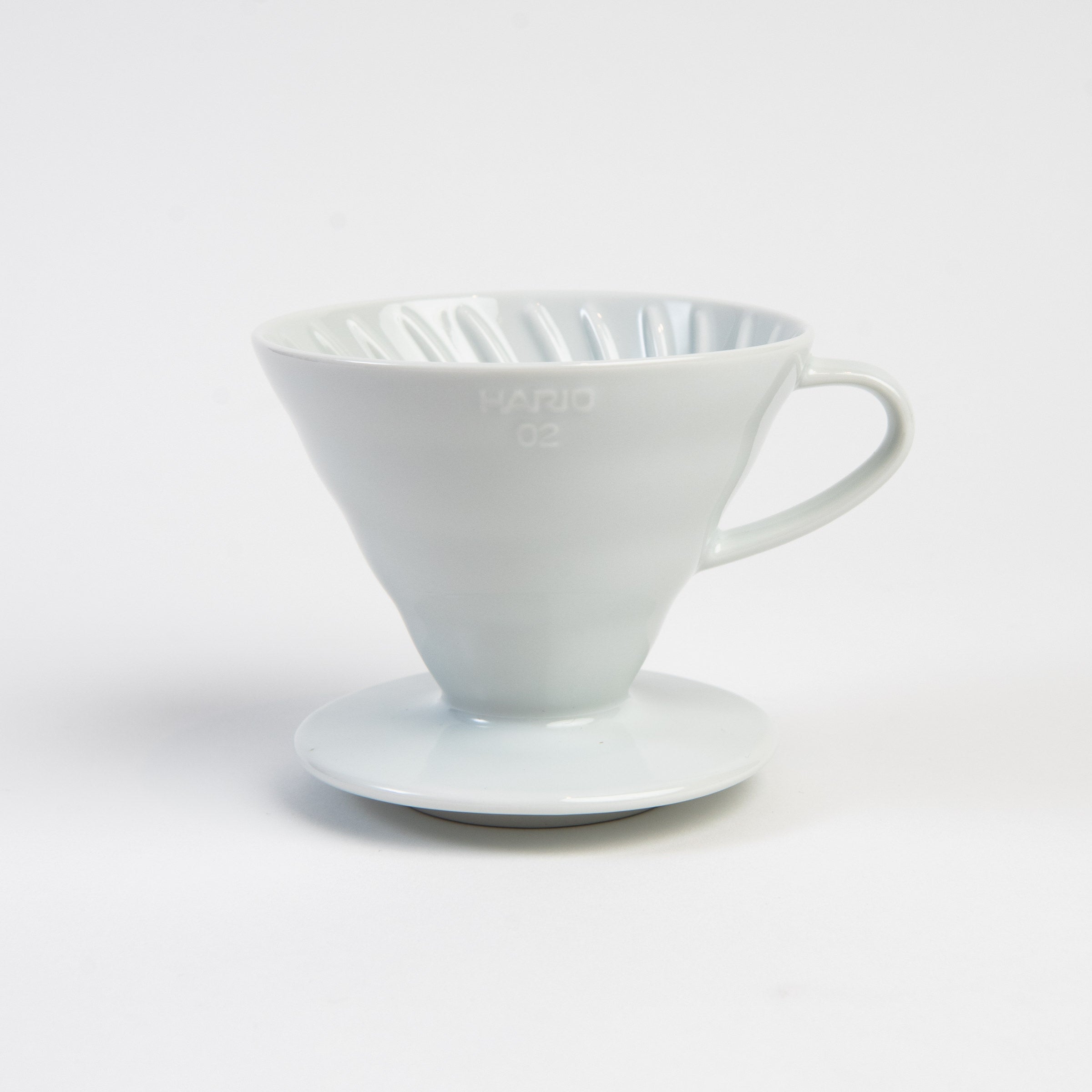 Hario V60 Ceramic Coffee Dripper 02 White on a white background at Addison West