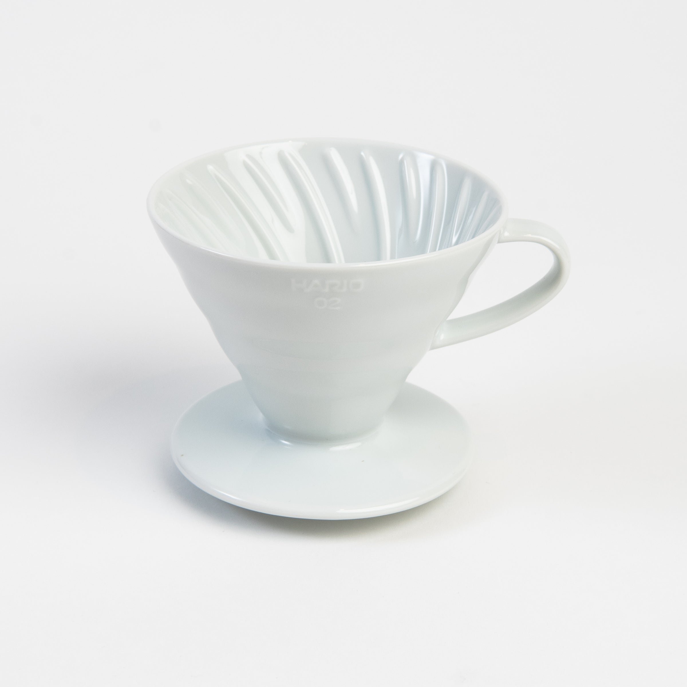 Hario V60 Ceramic Coffee Dripper 02 White on a white background at Addison West