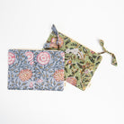 Block Print Pouch in Blue and green on a white background at Addison West