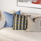 Ezra Earth Pillow on a sofa at Addison West