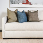 Wren Green Pillow on a sofa at Addison West