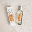 Lothantique Grapefruit Room Spray on a beige background at Addison West