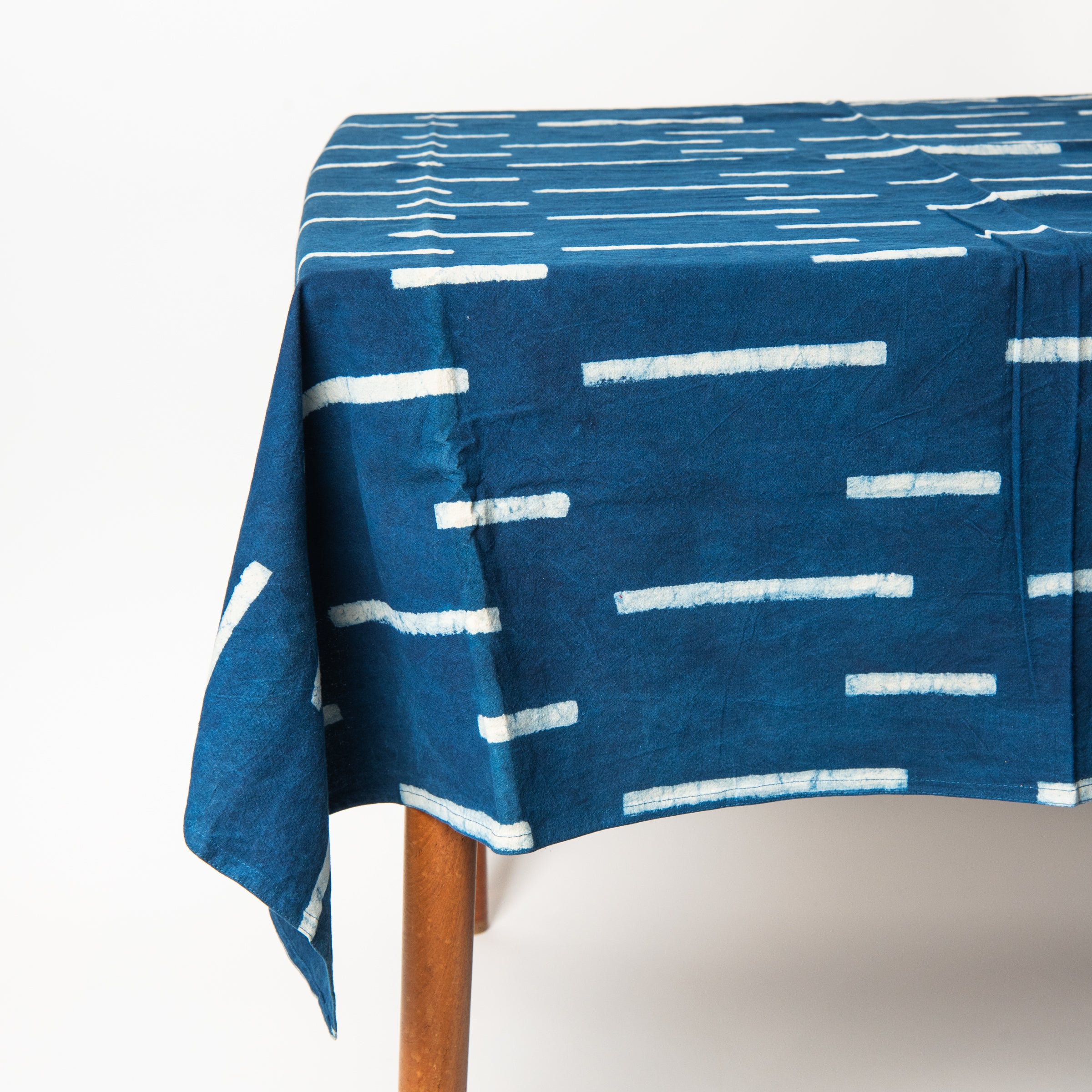 Indigo Block Print Tablecloth, 60" x 104" on a table at Addison West