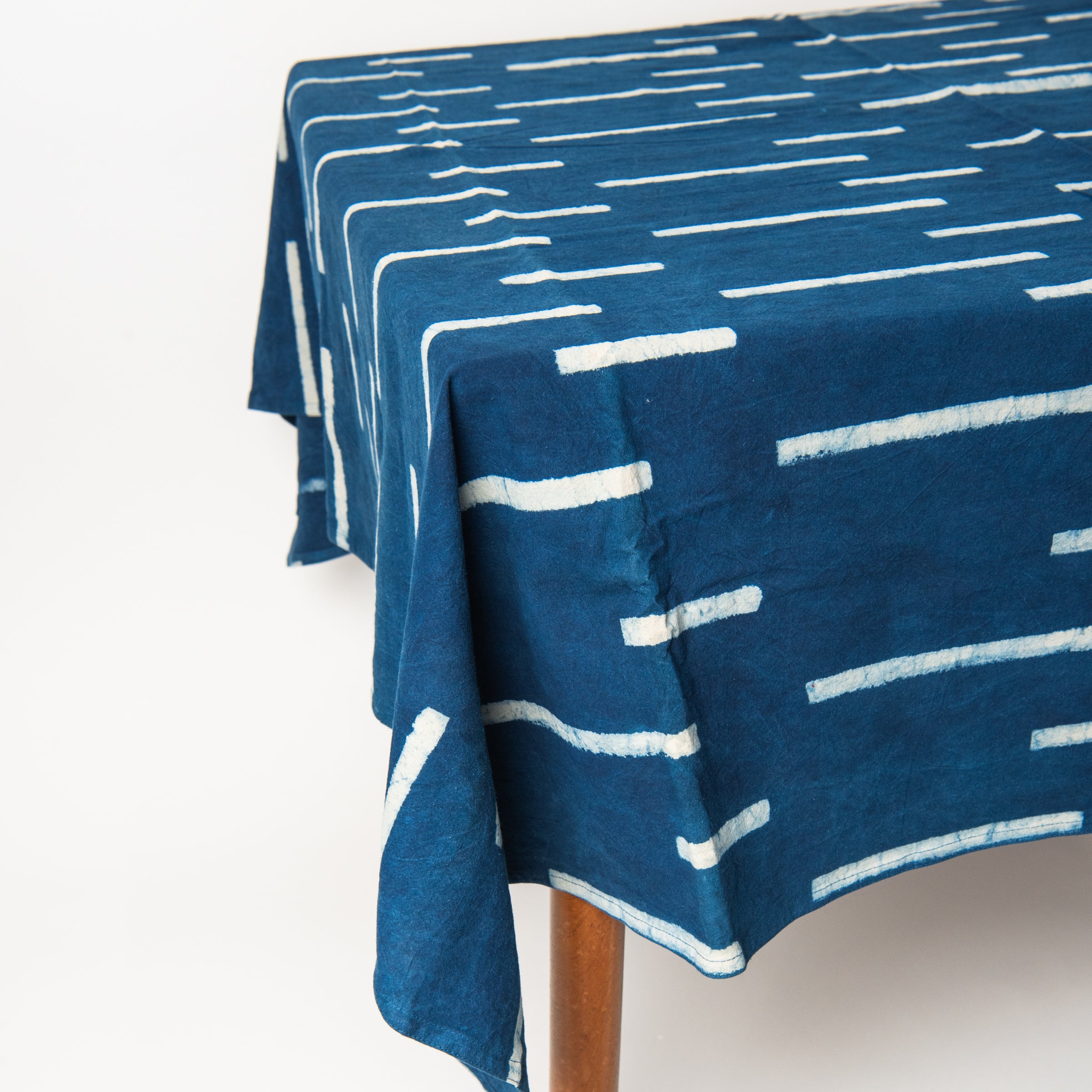Indigo Block Print Tablecloth, 60" x 104" on a table at Addison West