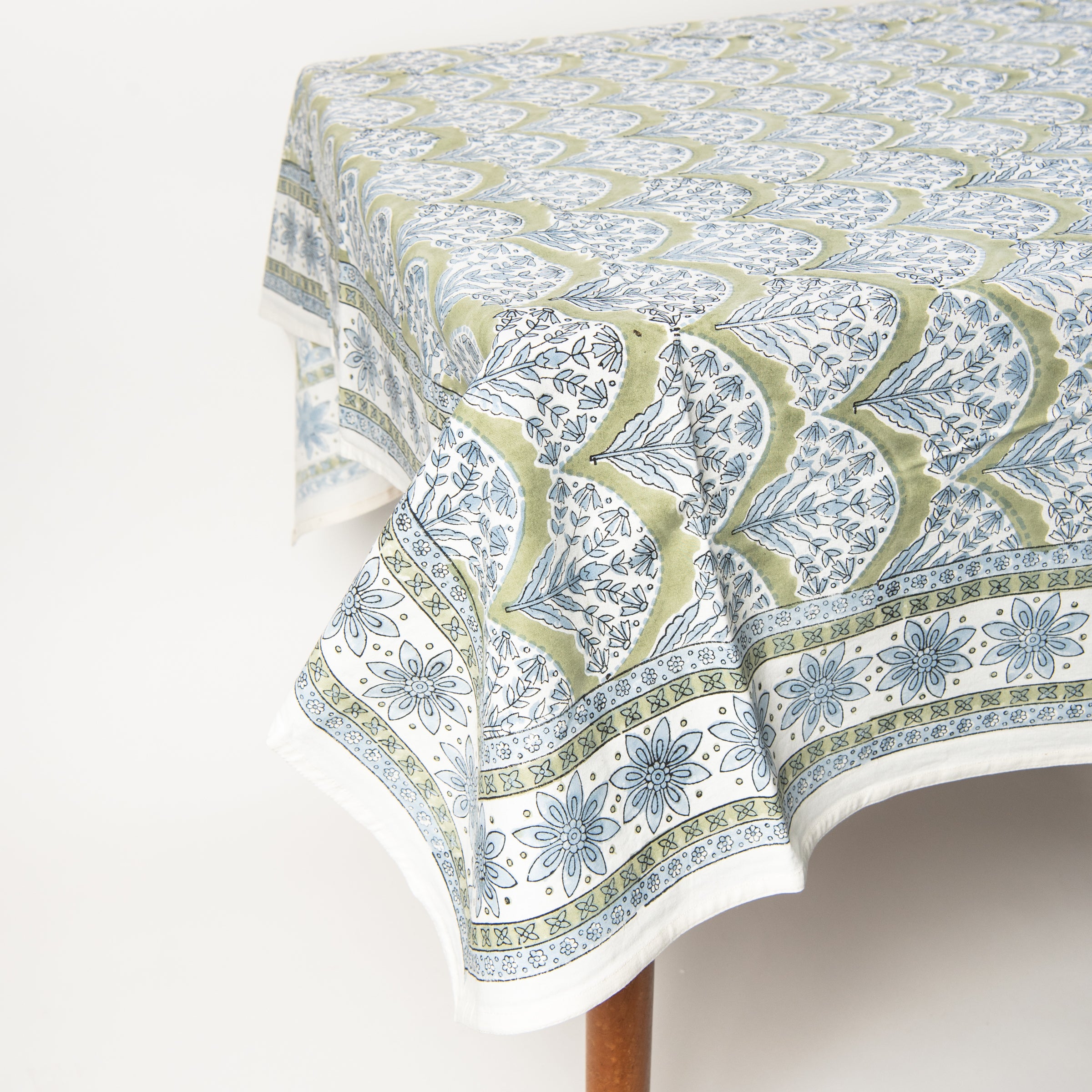 Summer Sage Block Print Tablecloth on a table at Addison West