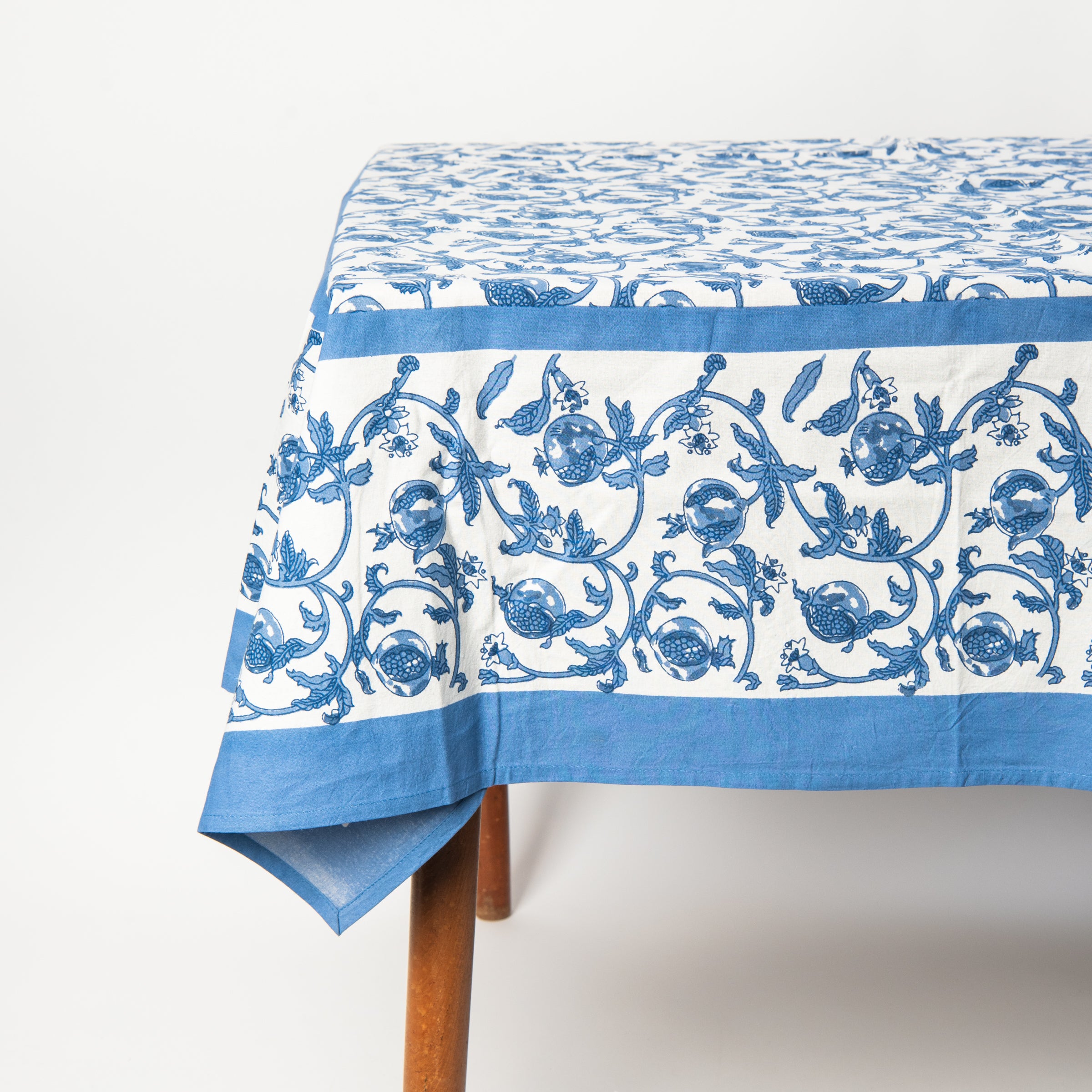 Granada Cornflower Tablecloth on a white background at Addison West