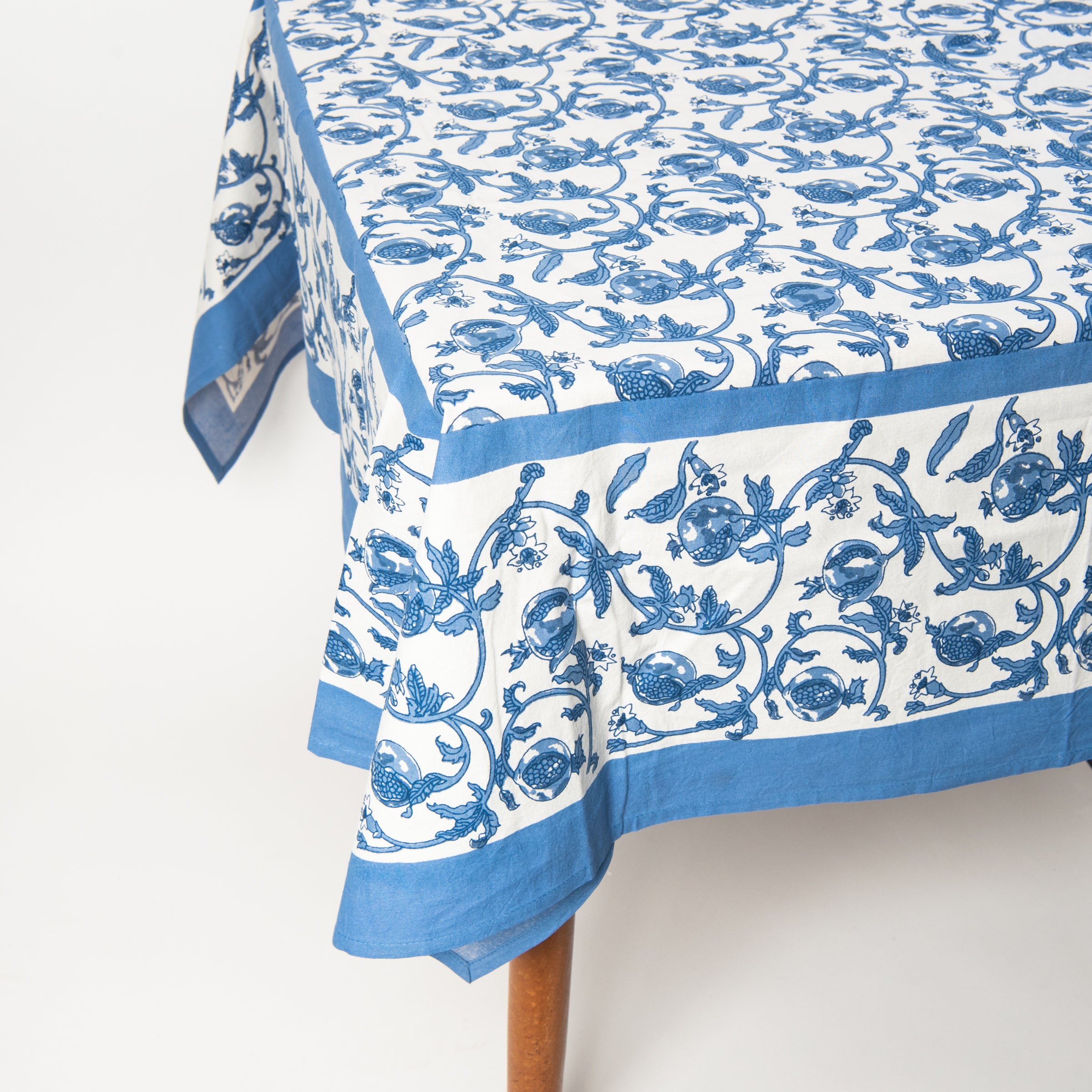 Granada Cornflower Tablecloth on a white background at Addison West