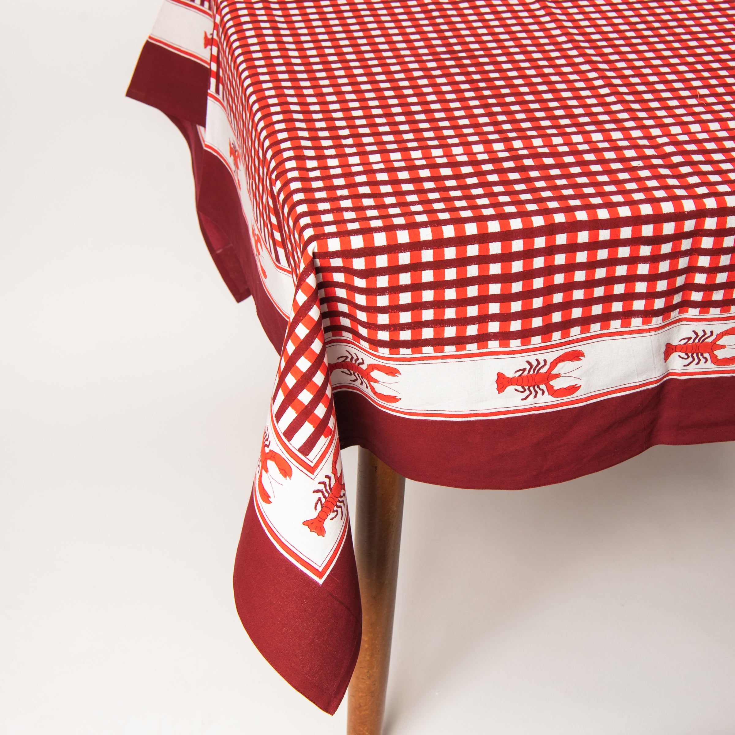 Lobster Blockprint Tablecloth, 60" x 90" on a table at Addison West
