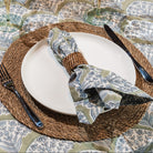 Rattan Oval Napkin Rings, Set of 4 on a table at Addison West