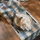 Grace Gingham Table Runner in Light Blue on a table at Addison West