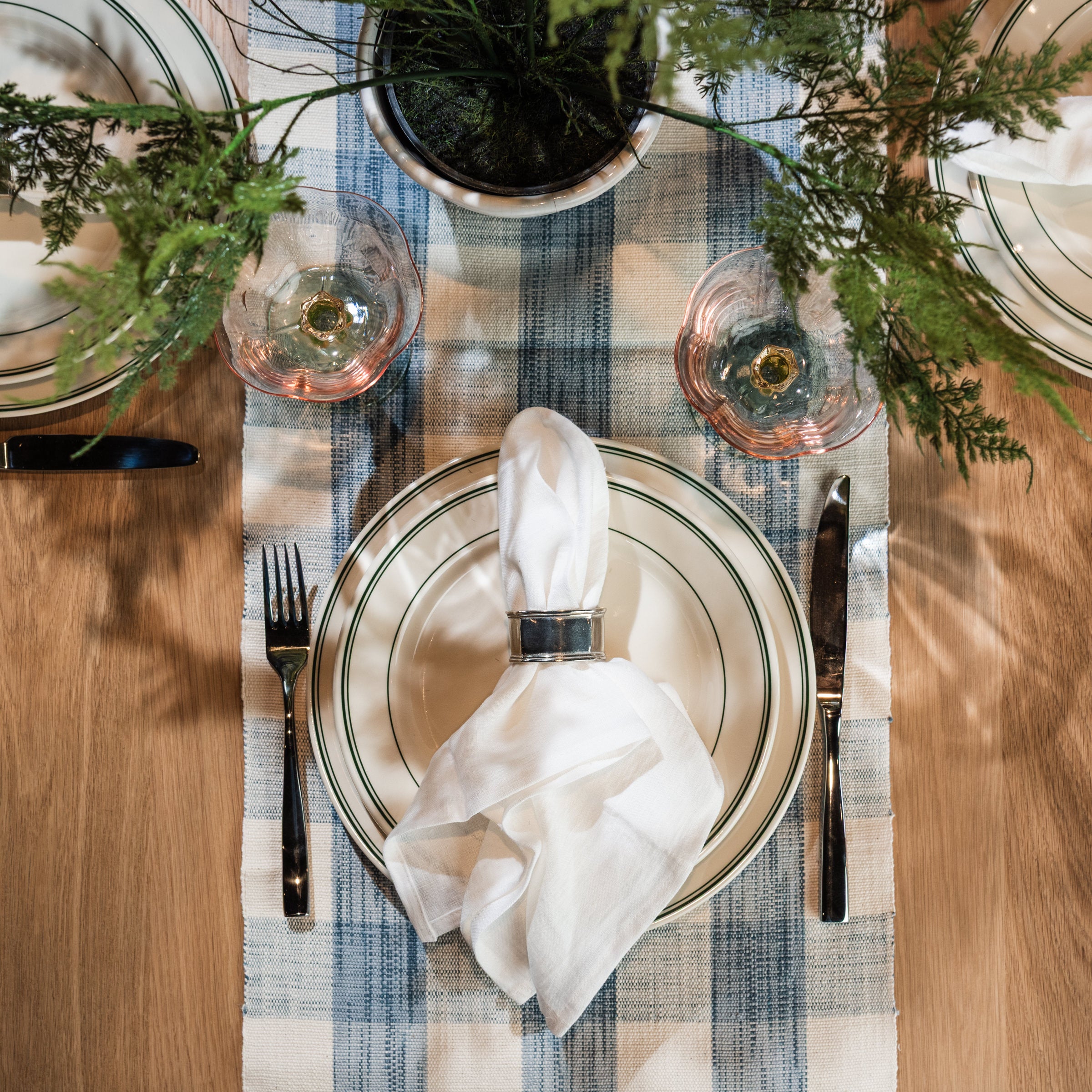 Classic Pewter Napkin Rings, Set of 4 on a table at Addison West