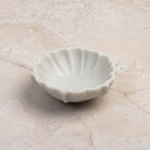 Dona Marble Bowl on a stone table at Addison West
