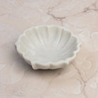 Dona Marble Bowl on a stone table at Addison West