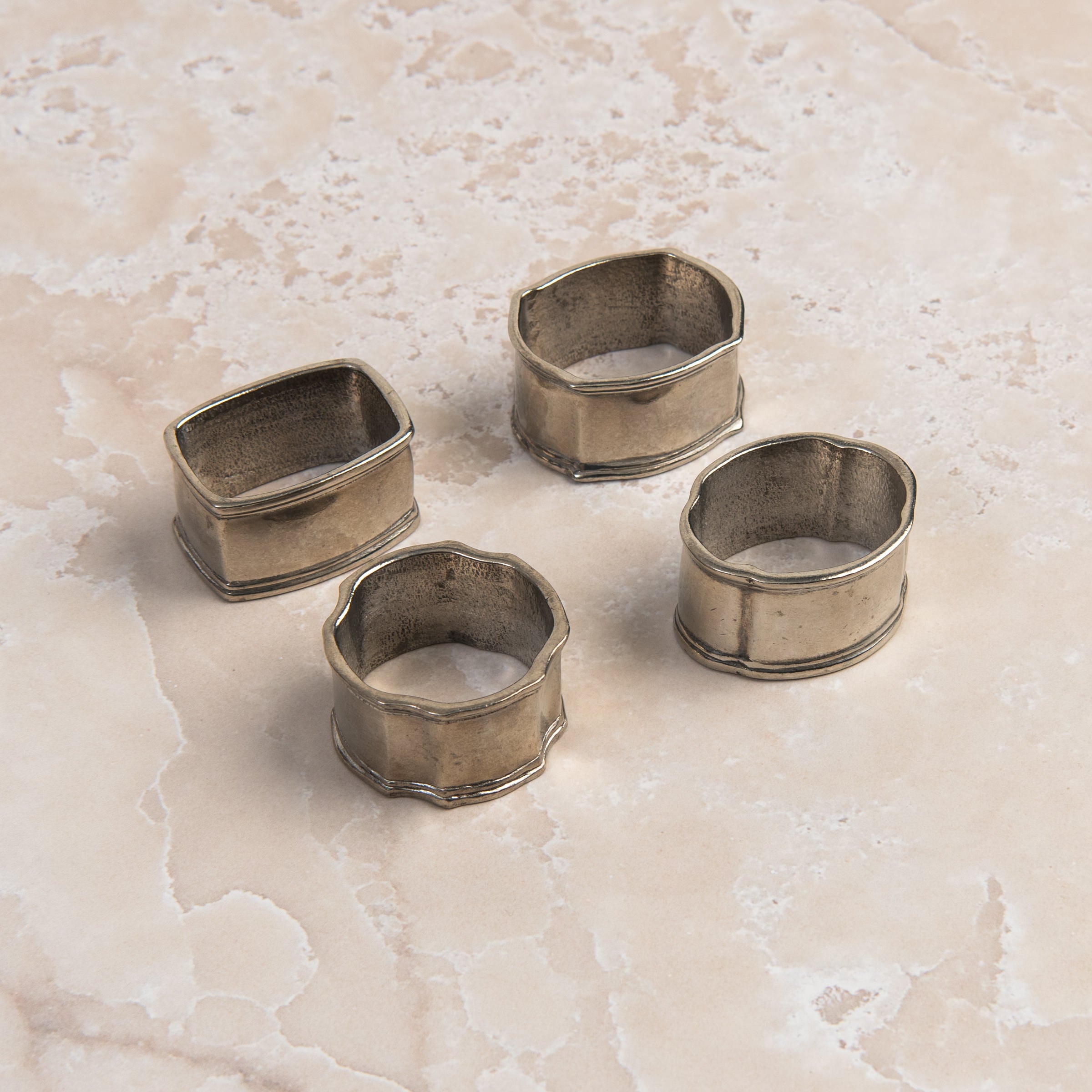 Classic Pewter Napkin Rings, Set of 4 on a table at Addison West