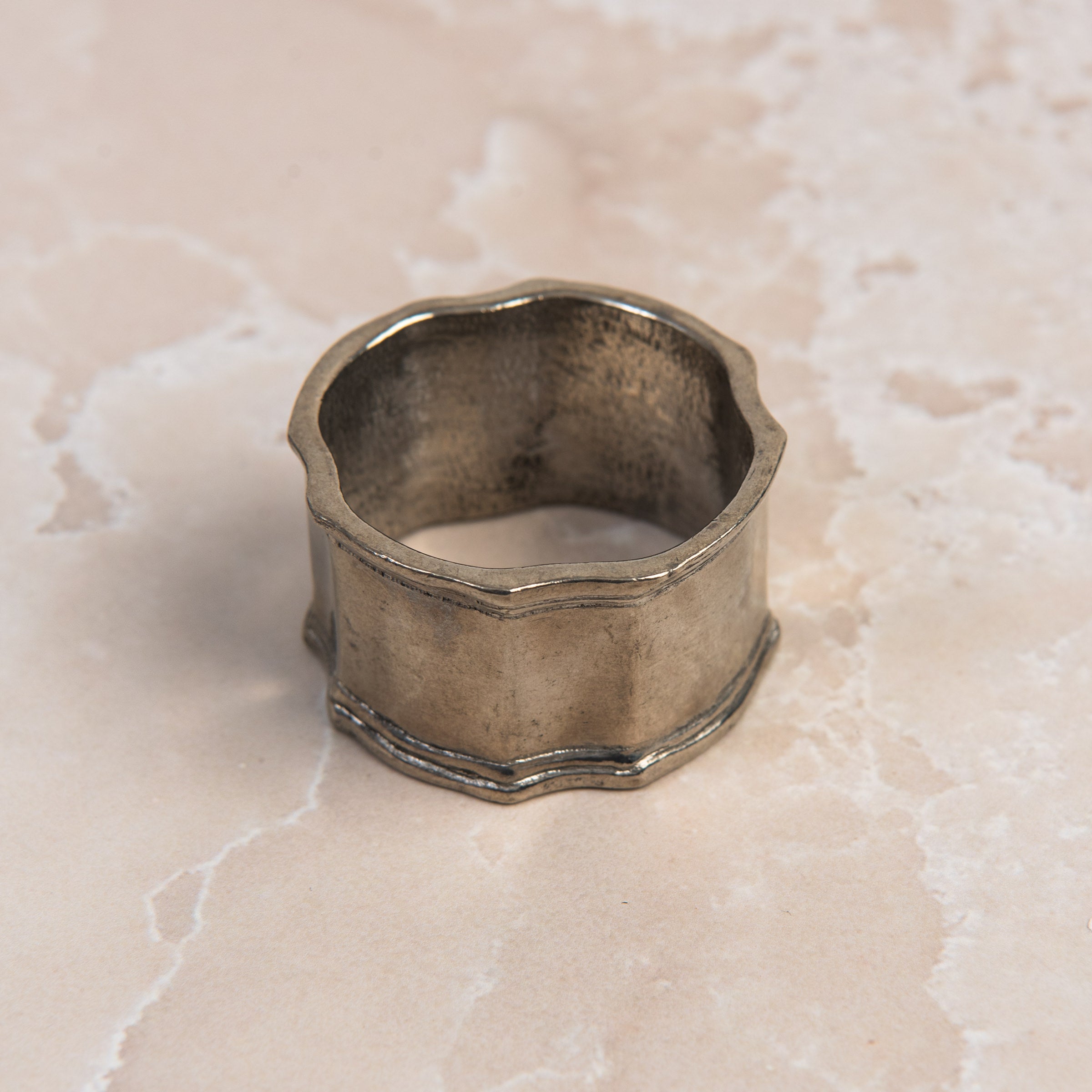 Classic Pewter Napkin Rings, Set of 4 on a table at Addison West
