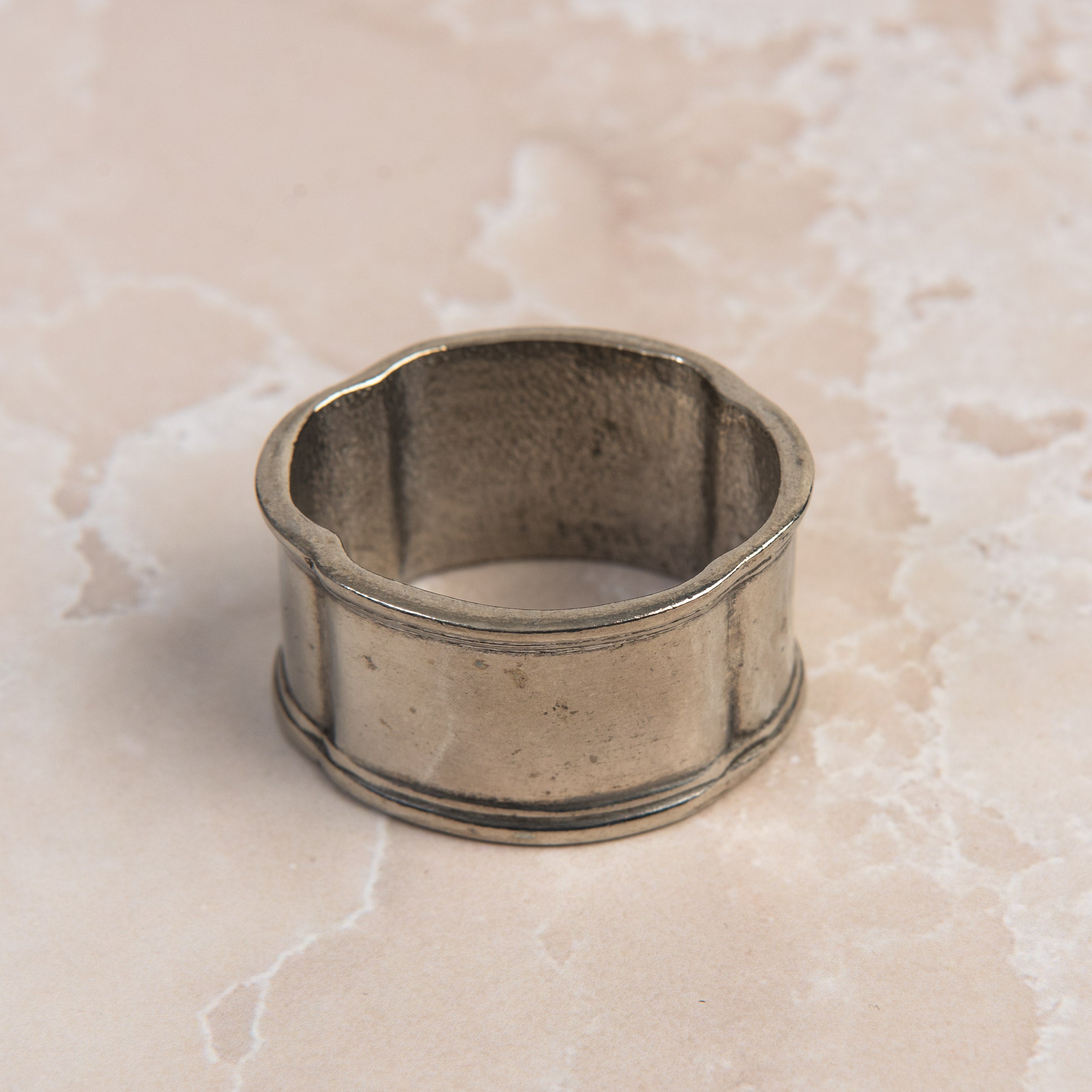 Classic Pewter Napkin Rings, Set of 4 on a table at Addison West