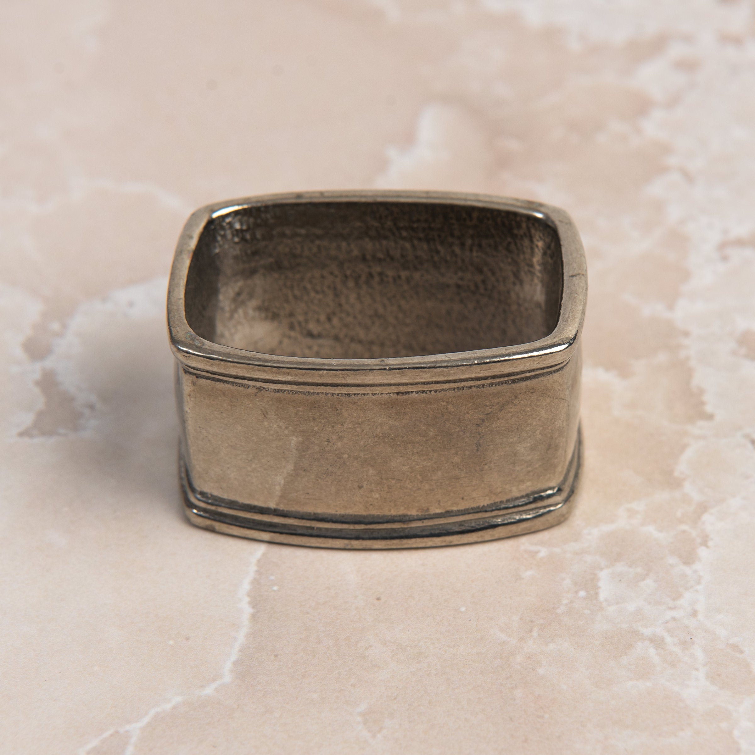 Classic Pewter Napkin Rings, Set of 4 on a table at Addison West