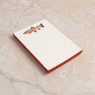 Rainbow Trout Notepad on a table at Addison West