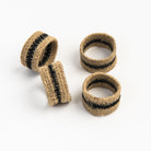 Black Seagrass Napkin Rings, Set of 4 on a white background at Addison West