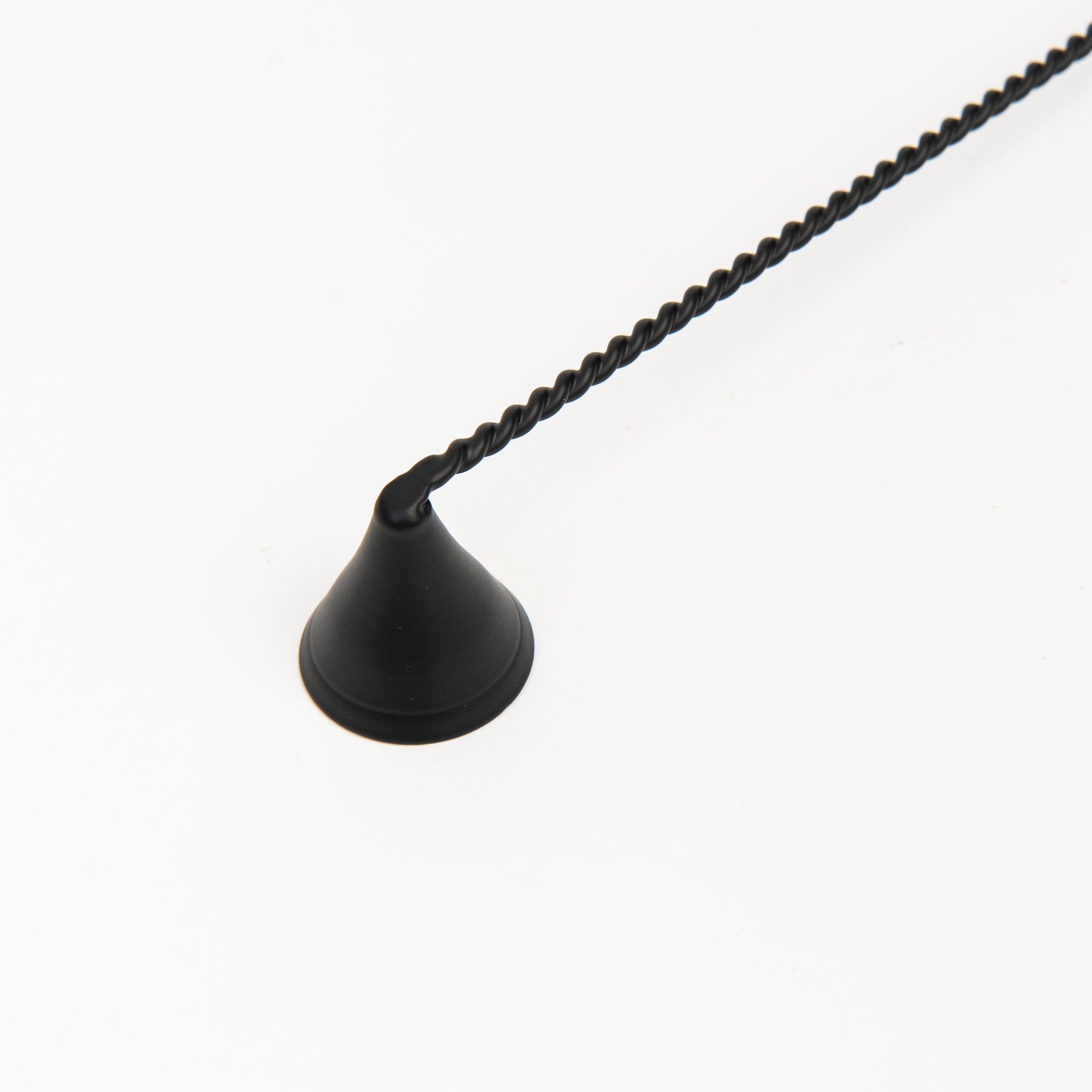 Black metal Candle Snuffer on a white background at Addison West