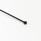 Black metal Candle Snuffer on a white background at Addison West