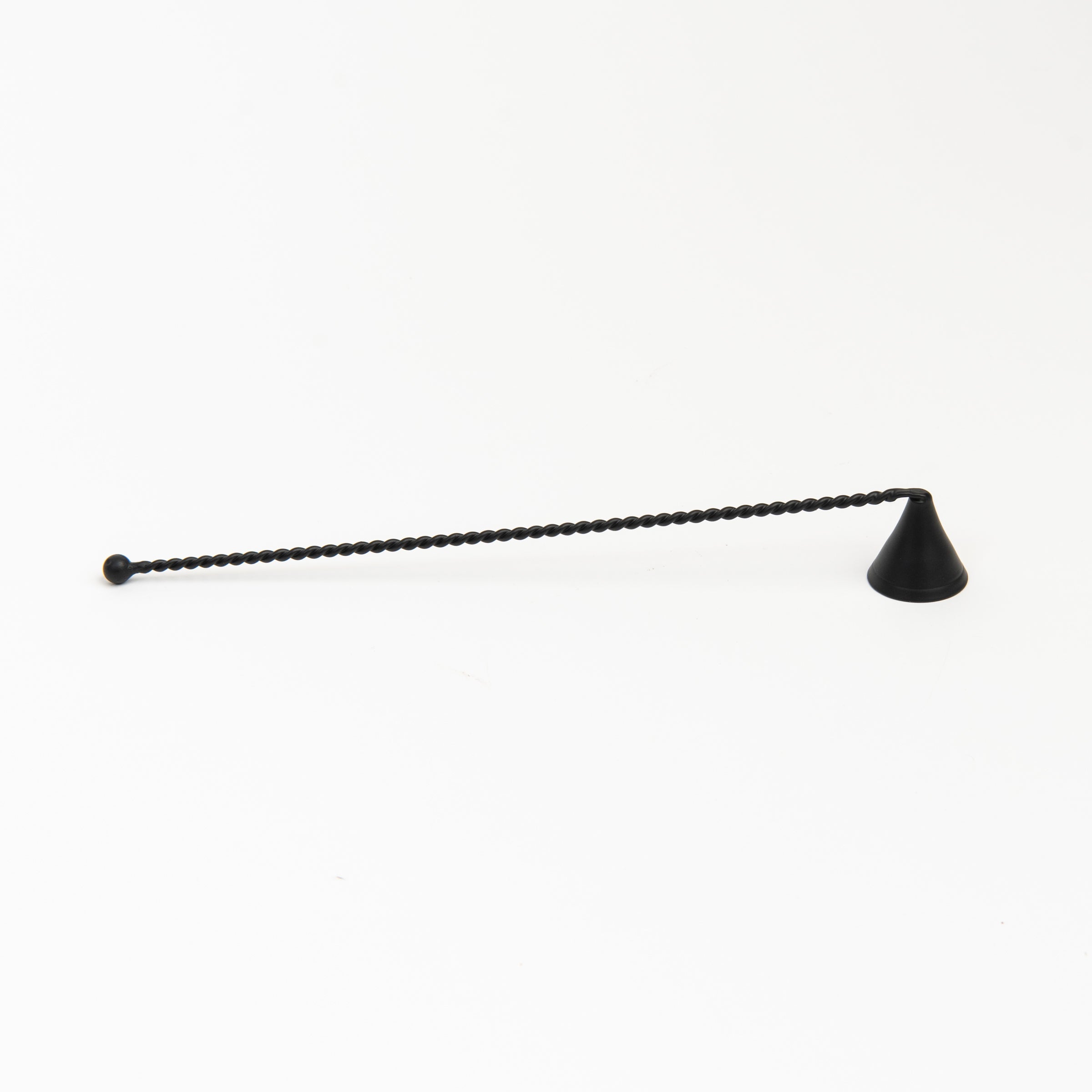 Black metal Candle Snuffer on a white background at Addison West