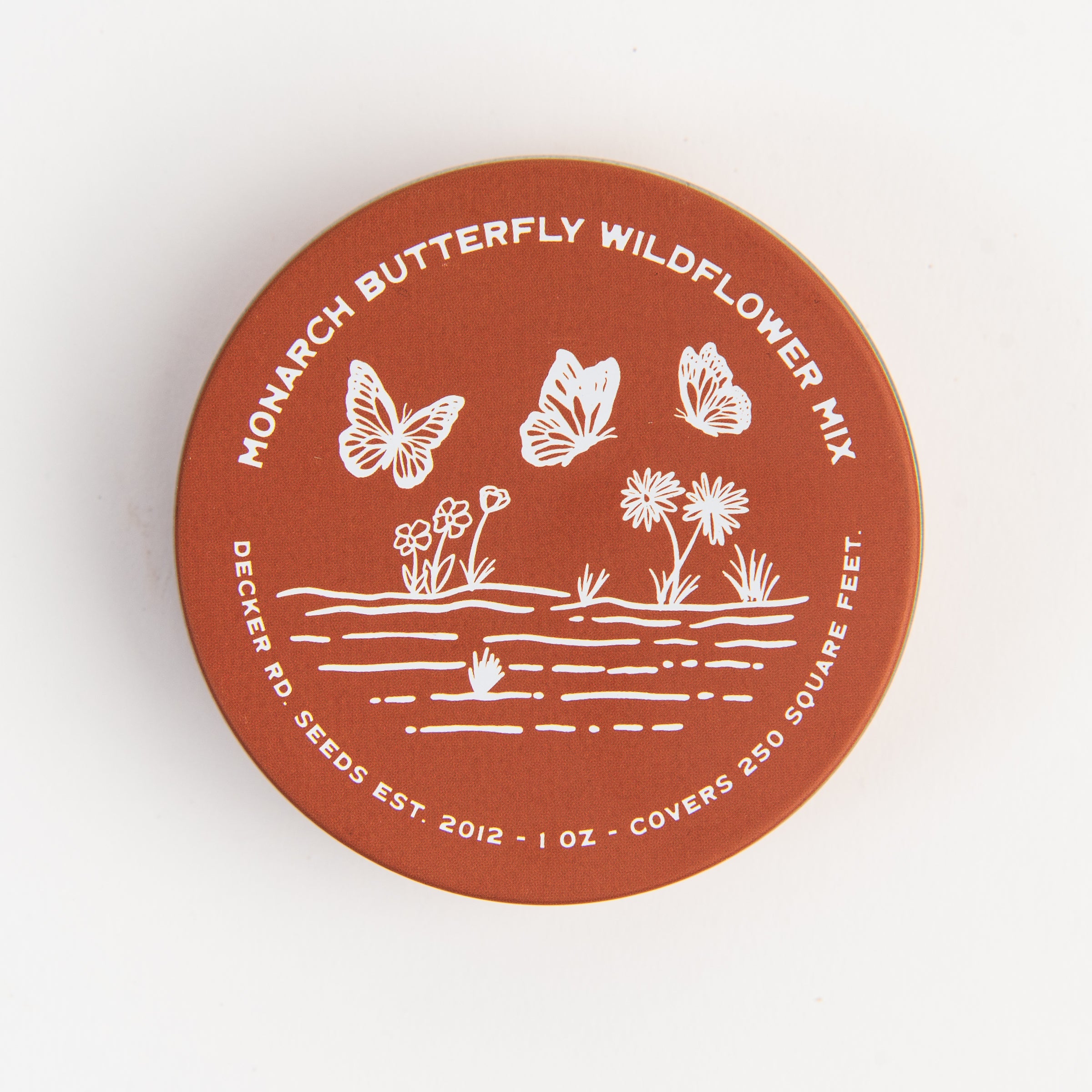 Wildflower Seeds 'Monarch Butterfly Mix' tin on a white background at Addison West