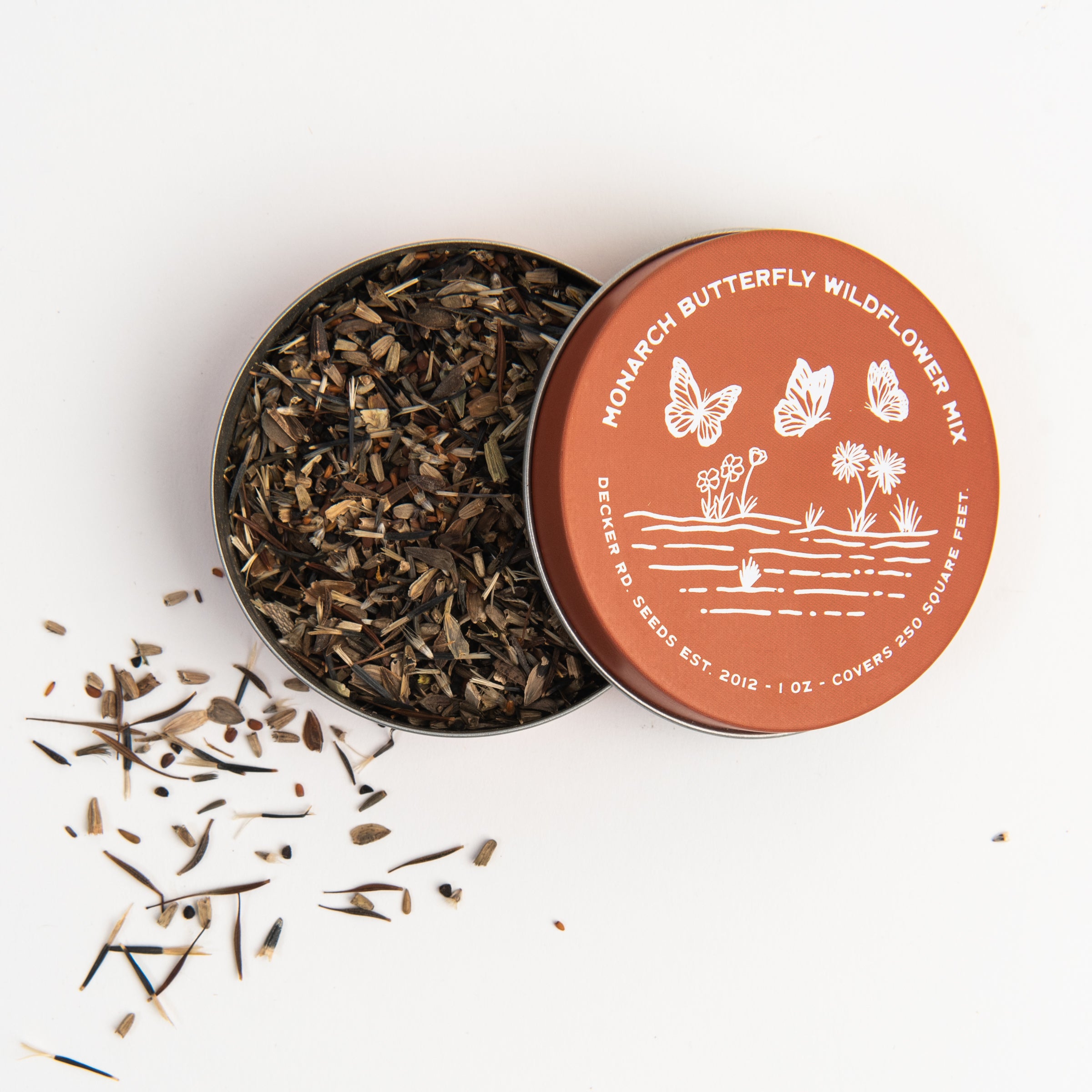 Wildflower Seeds 'Monarch Butterfly Mix' tin on a white background at Addison West
