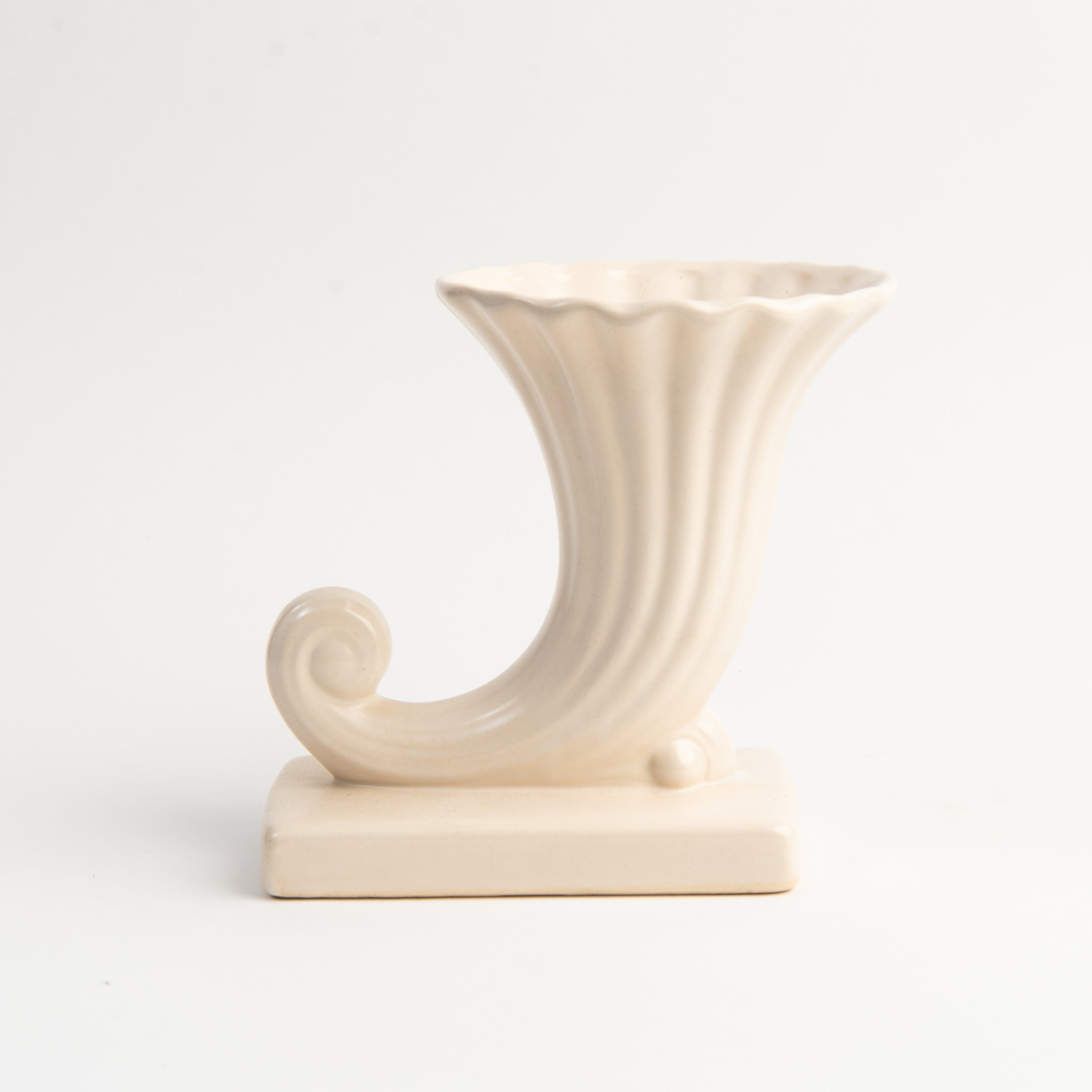 Vintage McCoy Vase on a white background at Addison West