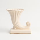 Vintage McCoy Vase on a white background at Addison West
